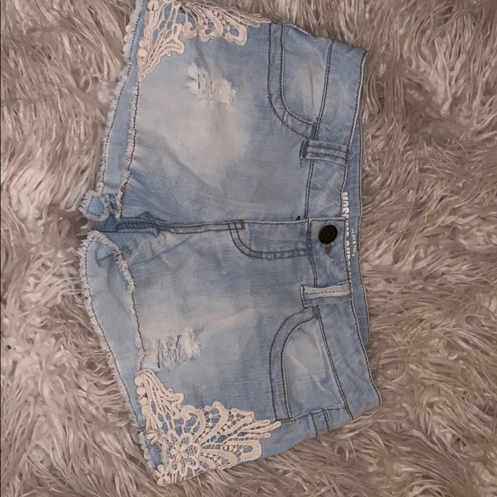 blue jean shorts with white lace on sides